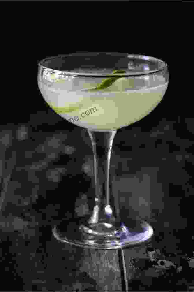 A Classic Daiquiri Garnished With A Lime Wedge Cuban Cocktails: 100 Classic And Modern Drinks