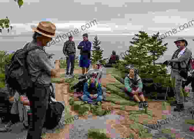 A Dedicated Park Ranger Patrolling The Trails Of Acadia National Park, Ensuring The Preservation Of Its Natural And Cultural Resources. The Sacred Shore (Song Of Acadia #2)