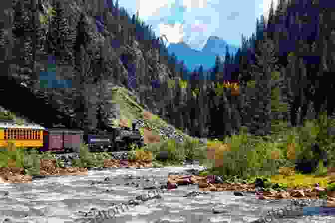 A Narrow Gauge Train Winding Through A Scenic Mountain Pass Narrow Gauge Panorama: Steaming Along The Rustic And Narrow