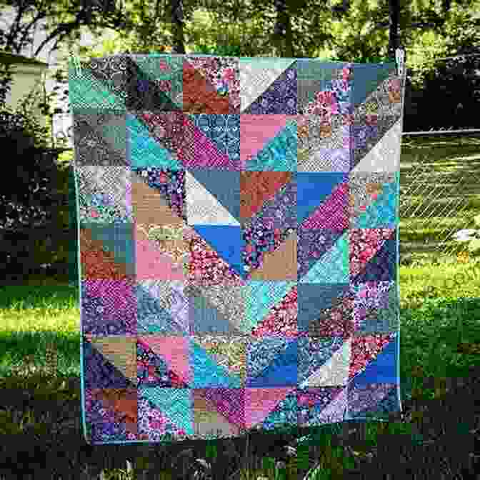 A Vibrant And Captivating Quilt Made From An Array Of Colorful Layer Cake Squares, Depicting A Mesmerizing Kaleidoscope Of Patterns. Moda All Stars Cakewalk: A Carnival Of Quilts That Begin With 10 Layer Cake Squares