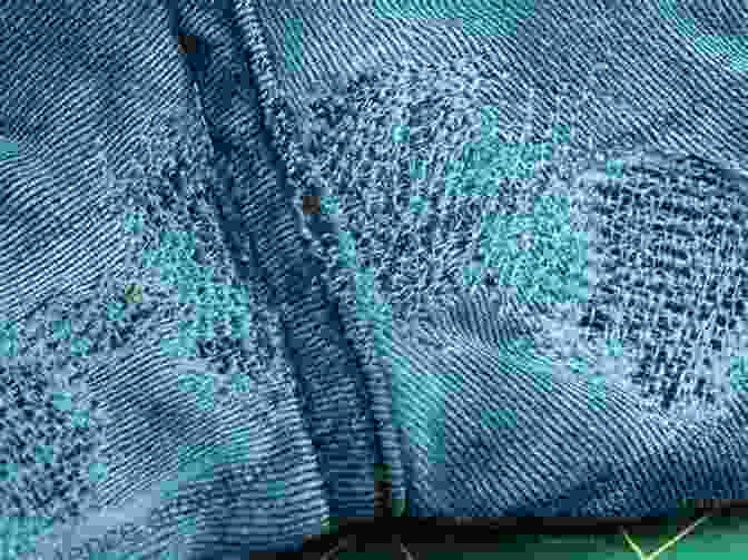 Close Up Of A Darned Hole In A Pair Of Jeans Creative Mending: Beautiful Darning Patching And Stitching Techniques (Over 300 Color Photos)