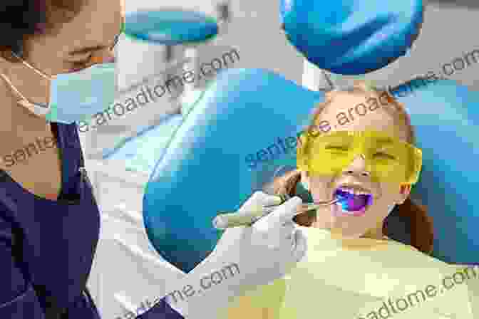 Pediatric Dentist Treating A Child With A Dental Emergency Handbook Of Clinical Techniques In Pediatric Dentistry